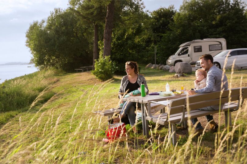 Two travellers at picnik table