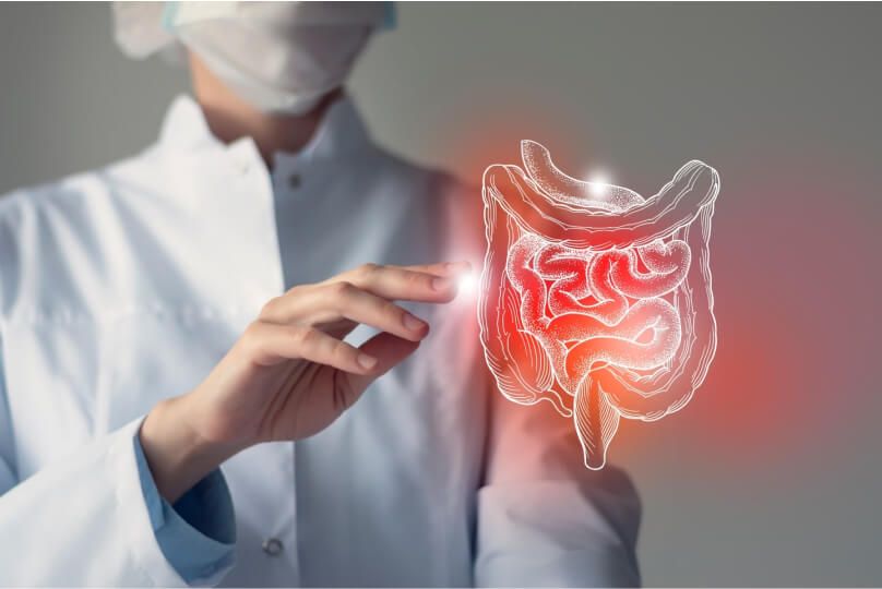 Scientist with 3D image of bowel
