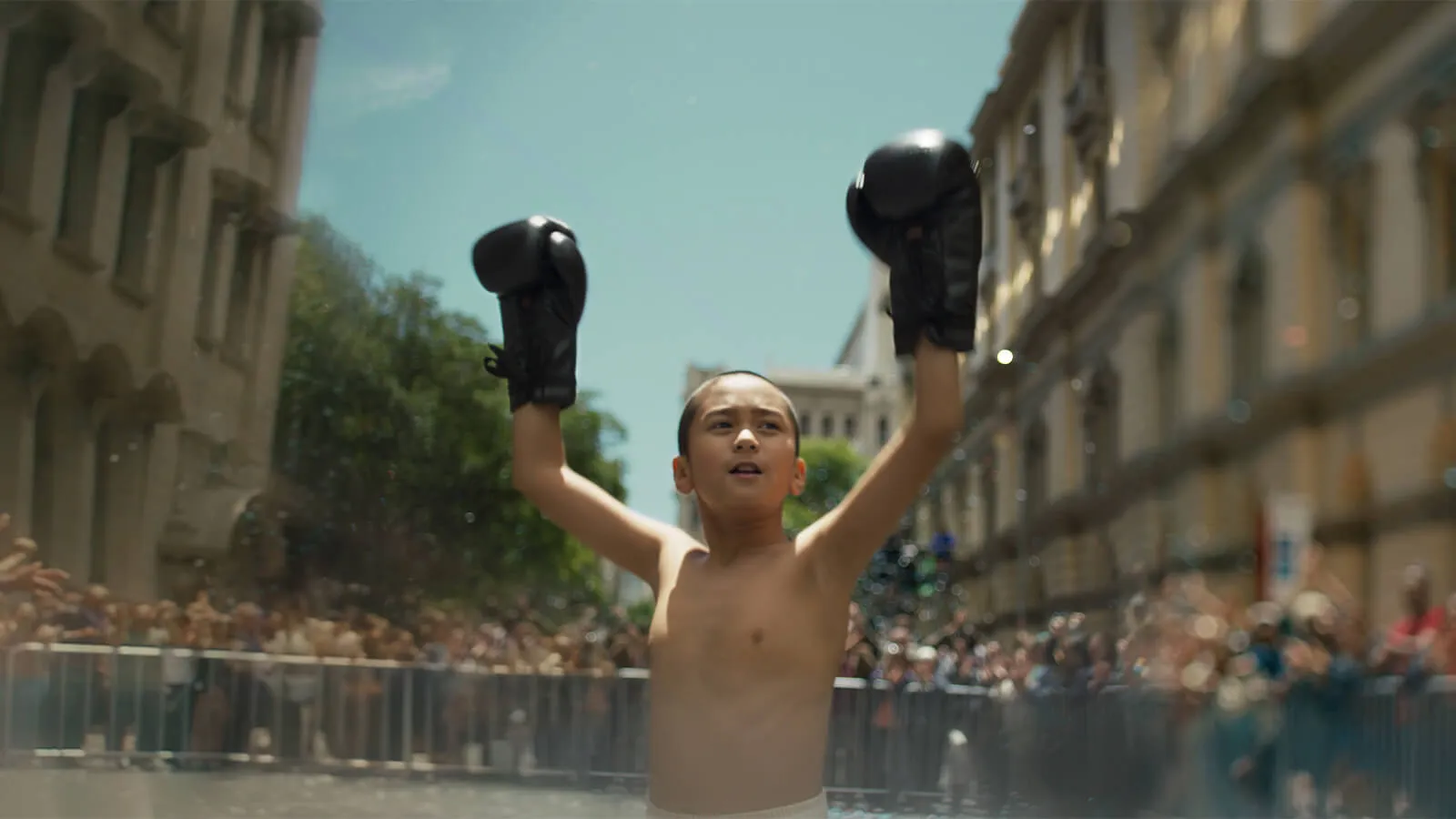 Boxing gloves held up high announcing win